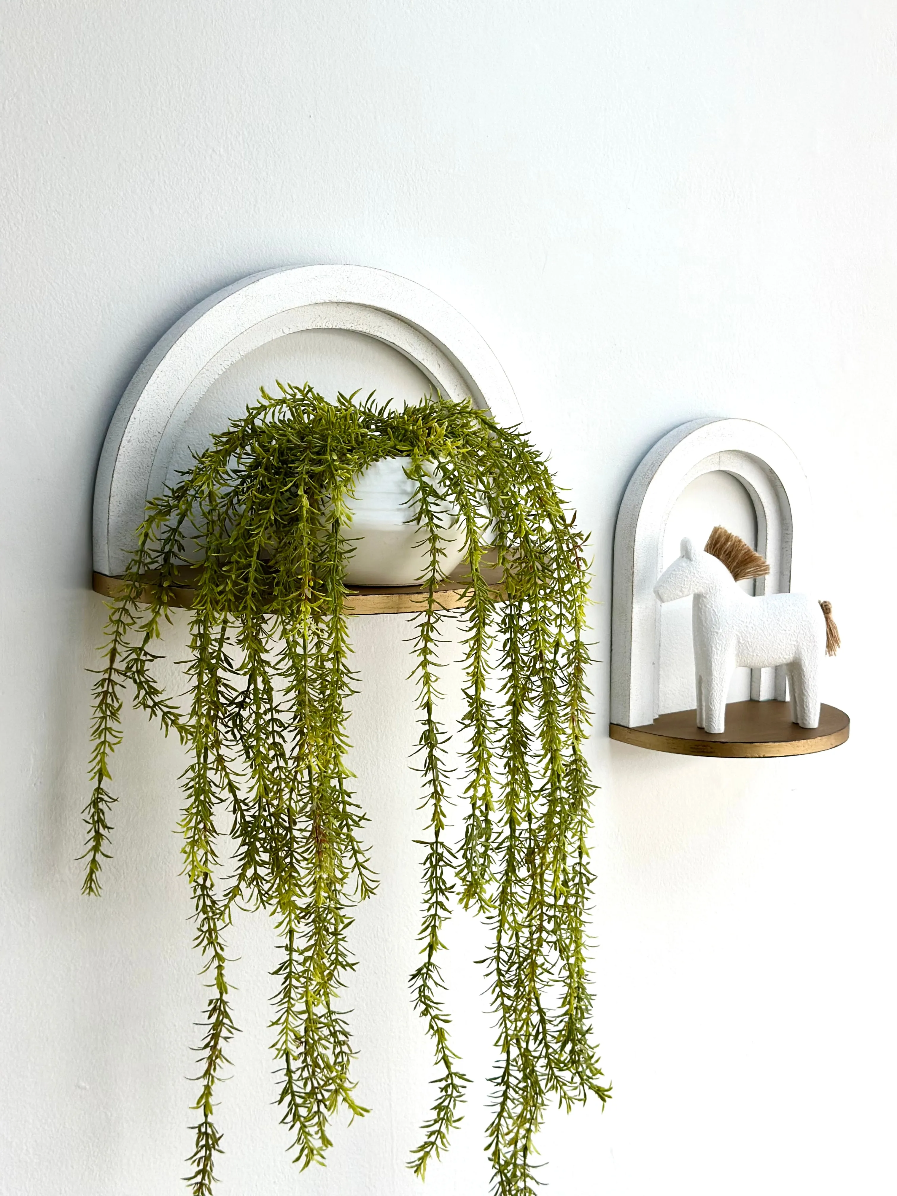 Arched White and Gold Shelves